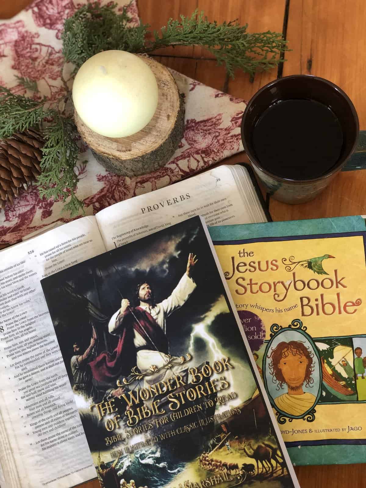 a Bible, story Bibles, coffee and candle